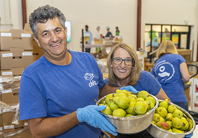 Two people volunteering at Food Bank of the Rockies
