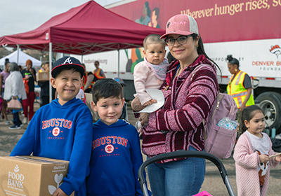 A family receiving food from Food Bank of the Rockies